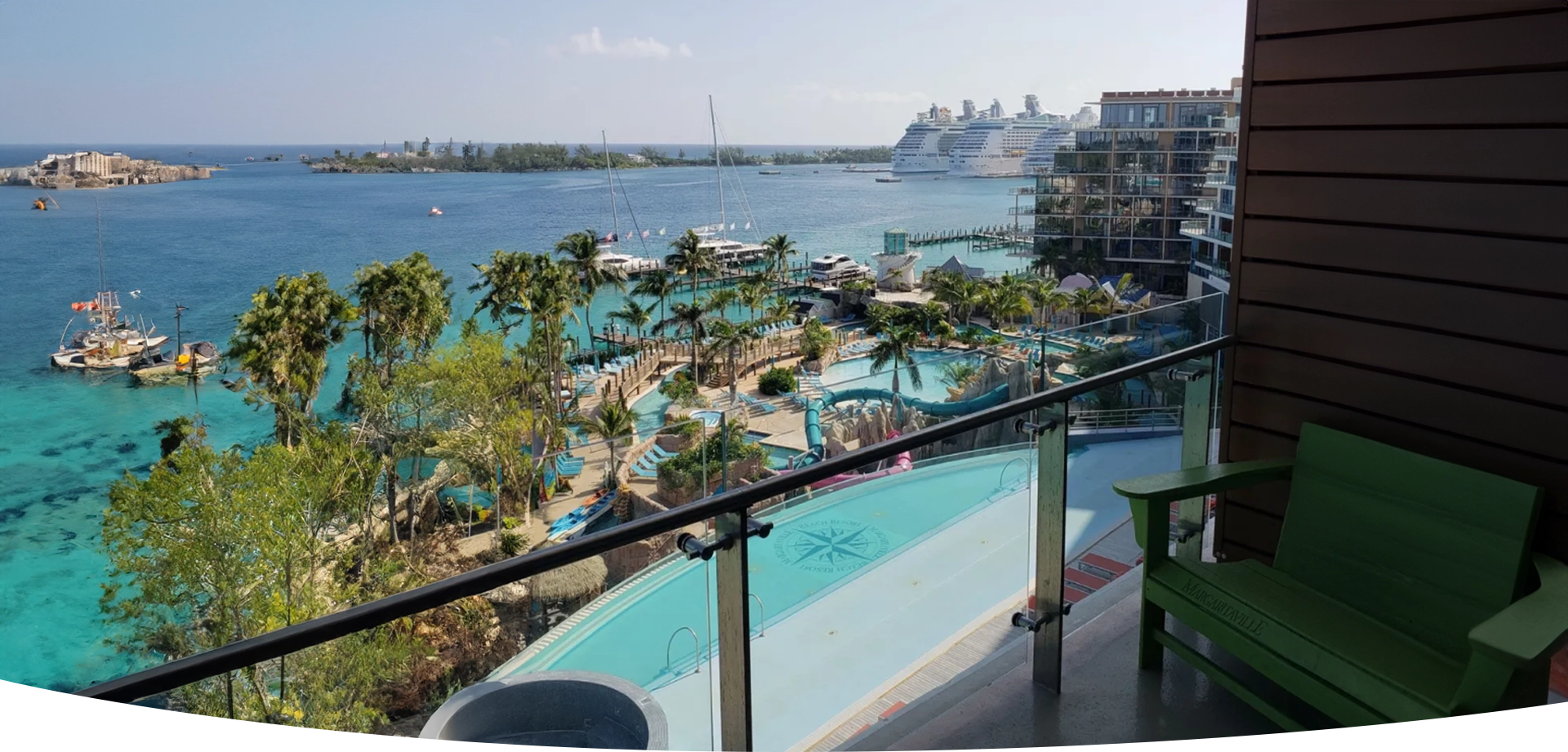 A view of the ocean from an outdoor pool.